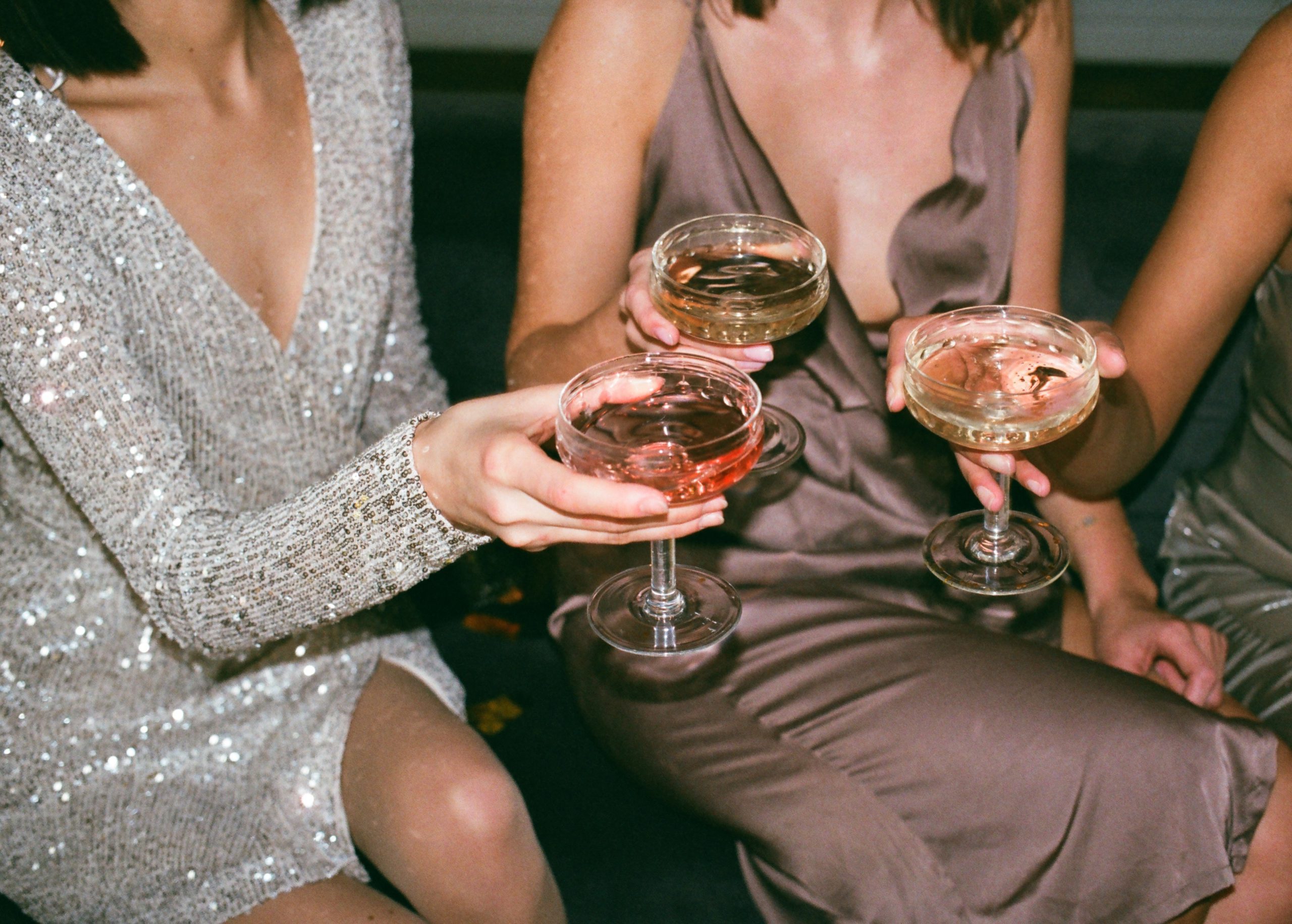 CBD and celebrities friends holding champagne glass