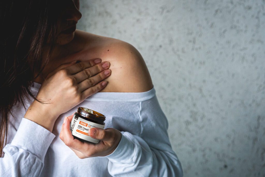Applying a CBD cream to an area of intact skin